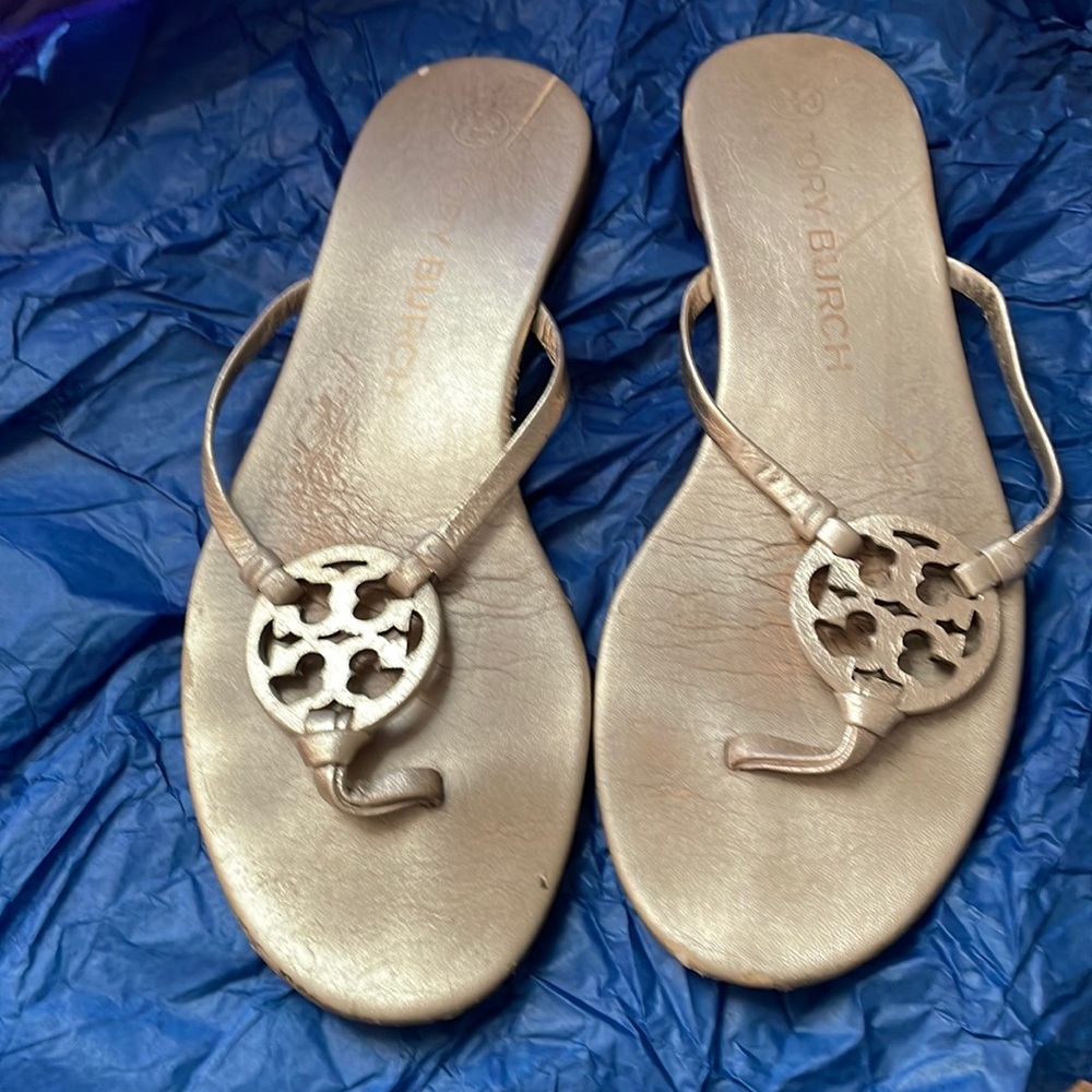 Tory Burch ladies size 9M, used lots of wear remaining. Please look at photos